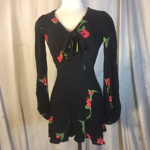 Long sleeved Reformation mini dress.